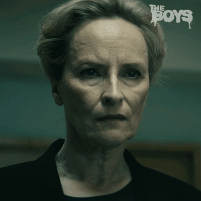 A Close Up Of A Woman 'S Face With The Words " The Boys " On The Bottom GIF