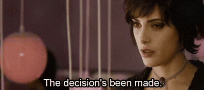 A Close Up Of A Woman 'S Face With The Words `` The Decision 'S Been Made '' Written On The Bottom . GIF