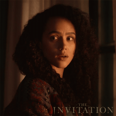 A Close Up Of A Woman 'S Face With The Words " The Invitation " On The Bottom GIF