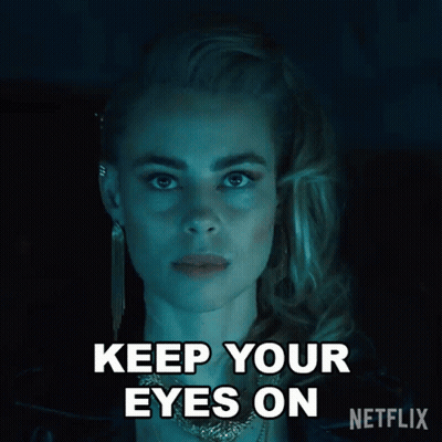 A Close Up Of A Woman 'S Face With The Words " The Road " Written Below Her GIF