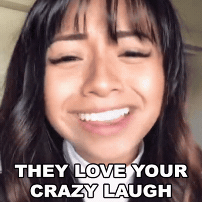 A Close Up Of A Woman 'S Face With The Words `` They Love Your Crazy Laugh '' On It . GIF