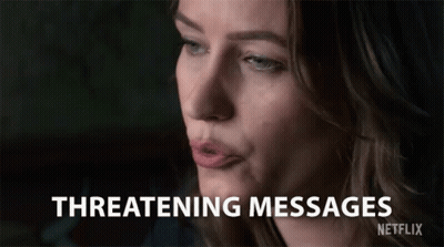 A Close Up Of A Woman 'S Face With The Words Threatening Messages Written On The Bottom GIF