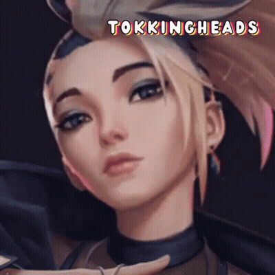 A Close Up Of A Woman 'S Face With The Words Tokingheads Written Above Her GIF