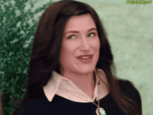 A Close Up Of A Woman 'S Face With The Words Trendizisst On The Bottom Right GIF