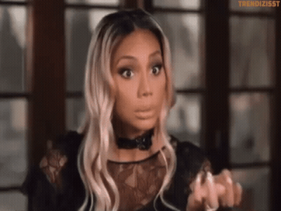 A Close Up Of A Woman 'S Face With The Words Trendizisst On The Bottom GIF