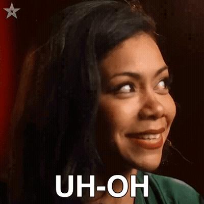 A Close Up Of A Woman 'S Face With The Words Uh-Oh On It . GIF