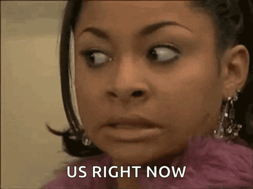 A Close Up Of A Woman 'S Face With The Words `` Us Right Now '' Written Next To Her . GIF