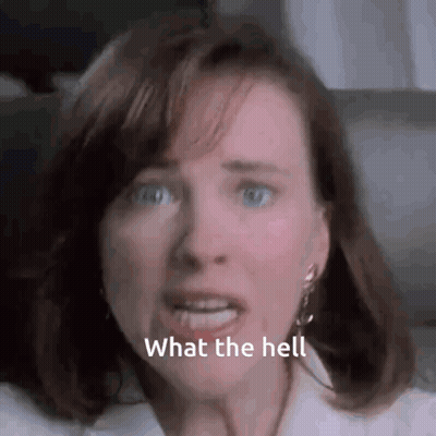 A Close Up Of A Woman 'S Face With The Words `` What The Hell '' Written On The Bottom . GIF