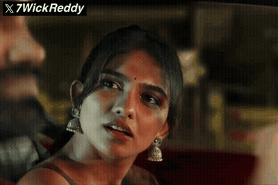 A Close Up Of A Woman 'S Face With The Words X7wickreddy Written Above Her GIF
