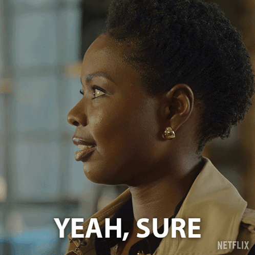 A Close Up Of A Woman 'S Face With The Words Yeah Sure Below Her GIF