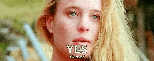 A Close Up Of A Woman 'S Face With The Words Yes Please Written On Her Face . GIF