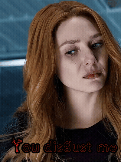 A Close Up Of A Woman 'S Face With The Words You Disgust Me Below It GIF