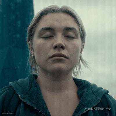 A Close Up Of A Woman 'S Face With Thunderbolts Written On The Bottom Right GIF