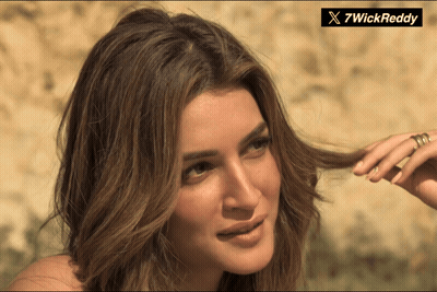 A Close Up Of A Woman 'S Hair With A 7Wickreddy Logo In The Corner GIF