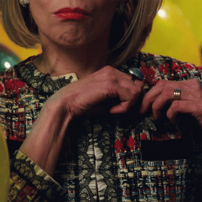 A Close Up Of A Woman 'S Hands With A Ring On Her Finger GIF