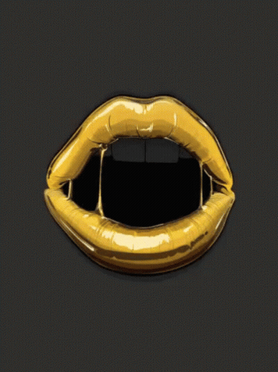 A Close Up Of A Woman 'S Mouth With Gold Lips GIF