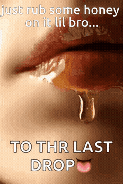A Close Up Of A Woman 'S Mouth With Honey Dripping From It GIF