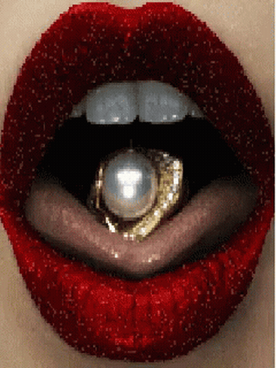 A Close Up Of A Woman 'S Mouth With Red Lipstick And A Gold Ring In It GIF