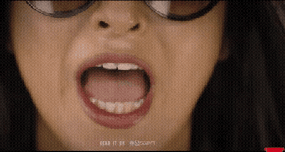 A Close Up Of A Woman 'S Mouth With The Words " Hear It On Saavn " Below It GIF