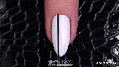 A Close Up Of A Woman 'S Nail With The Words 20 Nails Made In Animatica GIF