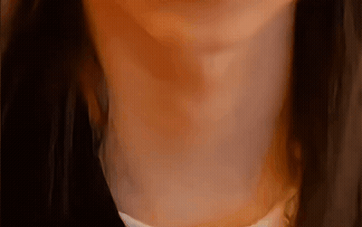 A Close Up Of A Woman 'S Neck And Chest GIF
