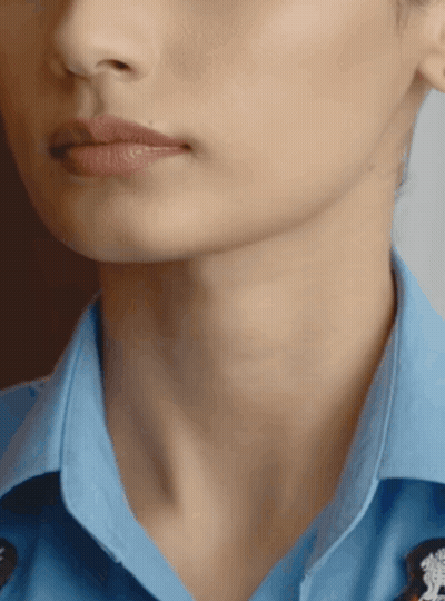 A Close Up Of A Woman 'S Neck And Chin GIF