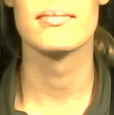 A Close Up Of A Woman 'S Neck With A Shadow On It GIF