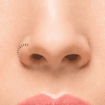A Close Up Of A Woman 'S Nose With A Few Lashes Visible GIF