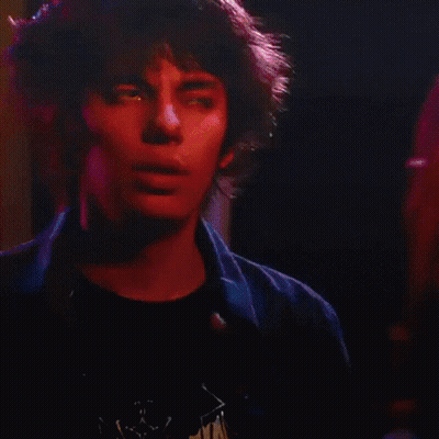 A Close Up Of A Woman Singing Into A Microphone With The Words Rod Rick Storytime On The Bottom GIF