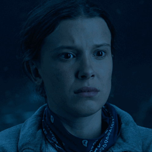 A Close Up Of A Woman Wearing A Bandana That Says ' Converse ' GIF