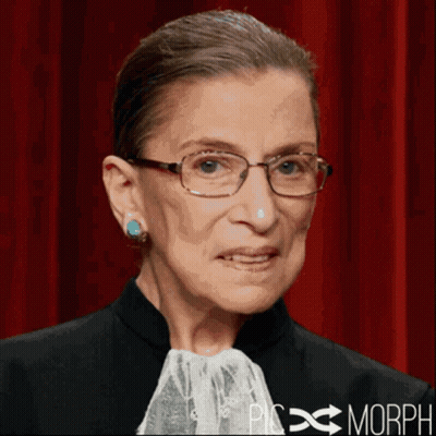 A Close Up Of A Woman Wearing Glasses And Earrings With Morph Written On The Bottom Right GIF