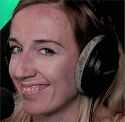 A Close Up Of A Woman Wearing Headphones And A Microphone GIF