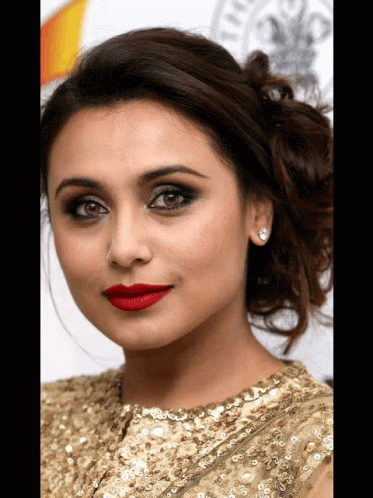 A Close Up Of A Woman Wearing Red Lipstick GIF
