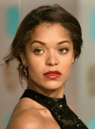 A Close Up Of A Woman Wearing Red Lipstick GIF