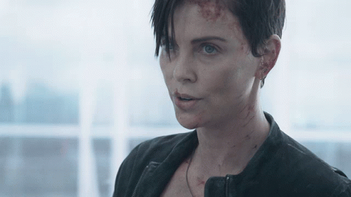 A Close Up Of A Woman With A Black Jacket On GIF
