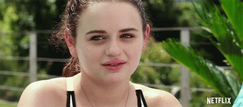 A Close Up Of A Woman With A Netflix Logo In The Corner GIF