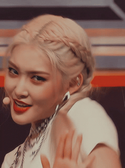 A Close Up Of A Woman With Blonde Hair Wearing Red Lipstick GIF