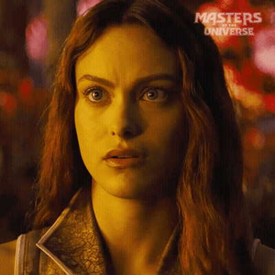 A Close Up Of A Woman With Masters Of The Universe Written On The Bottom GIF