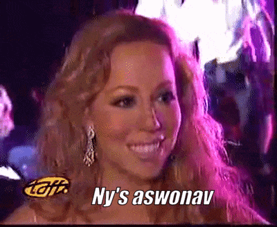 A Close Up Of A Woman With Ny 'S Aswonav Written On The Bottom GIF