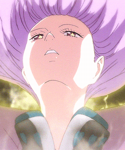 A Close Up Of A Woman With Purple Hair GIF