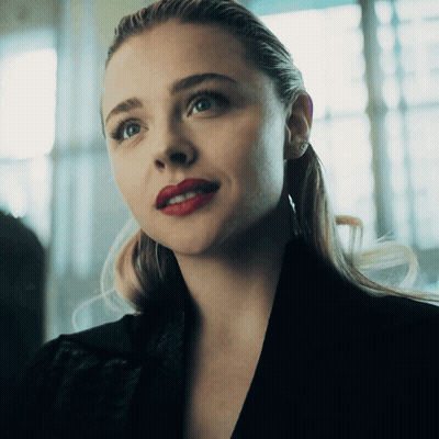A Close Up Of A Woman With Red Lips GIF