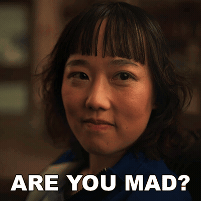 A Close Up Of A Woman With The Words " Are You Mad " Above Her GIF