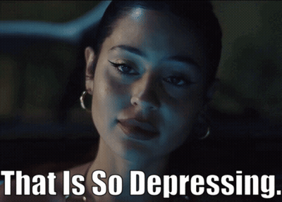 A Close Up Of A Woman With The Words That Is So Depressing Below Her GIF