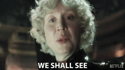 A Close Up Of A Woman With The Words We Shall See Behind Her GIF