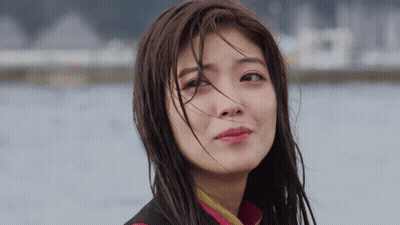 A Close Up Of A Woman With Wet Hair GIF