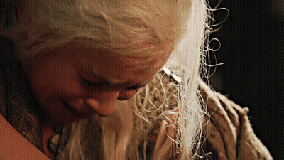 A Close Up Of A Woman With White Hair GIF