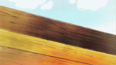 A Close Up Of A Wooden Fence With A Blue Sky In The Background GIF