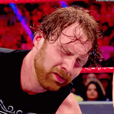 A Close Up Of A Wrestler 'S Face With The Words " The Next Thing " On The Bottom Right GIF