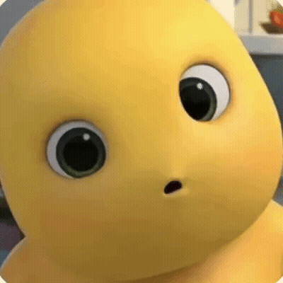 A Close Up Of A Yellow Cartoon Character With Big Eyes And A Surprised Look On Its Face . GIF
