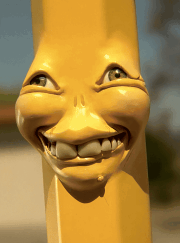 A Close Up Of A Yellow Pencil With A Funny Face GIF